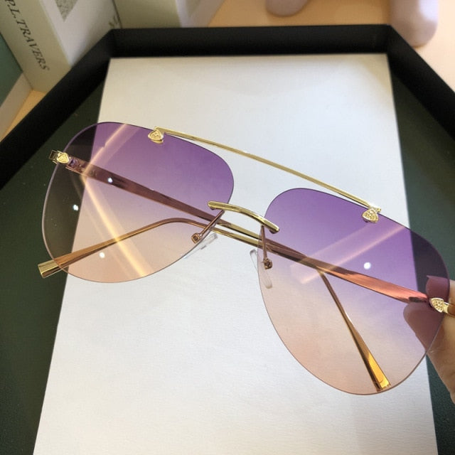 Designer Fashion Oval Rimless Sunglasses Glasses Fashion Men Women UV400 Sunglasses